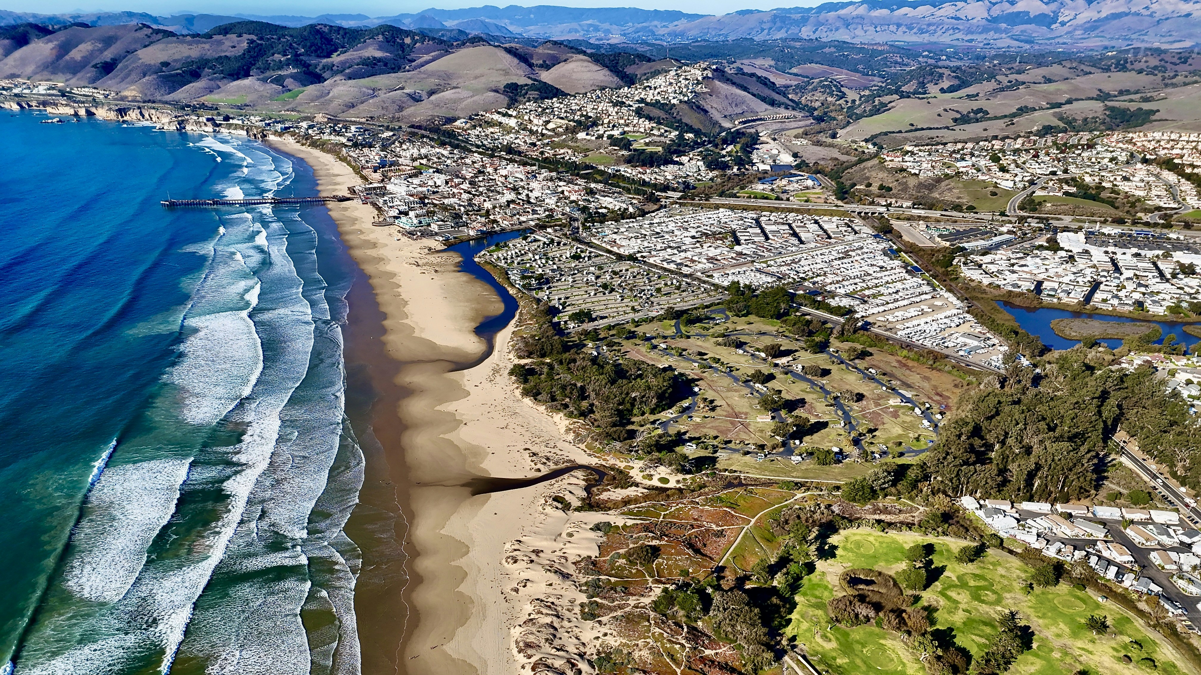 An aerial view of a beach and ocean