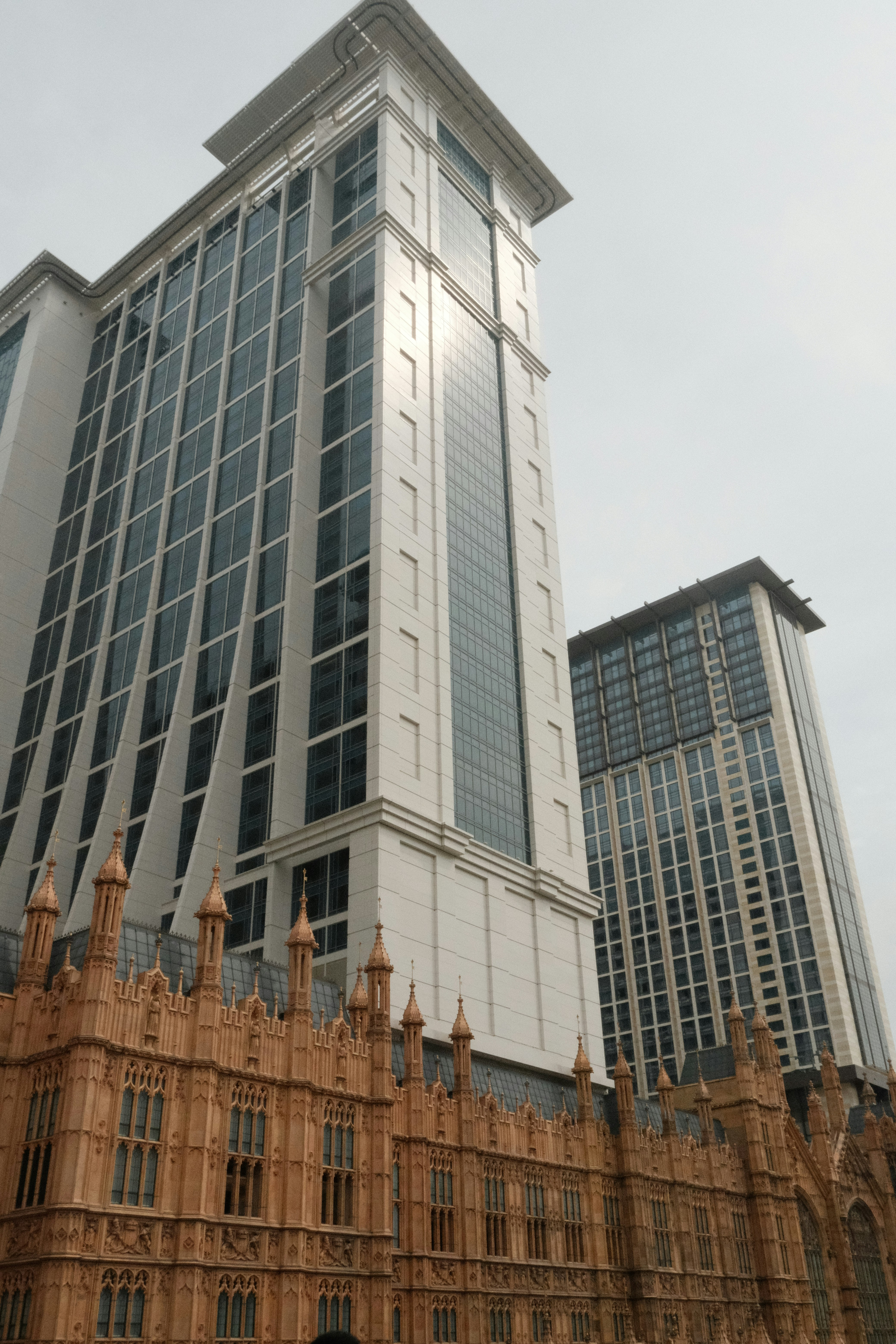 A tall building with a clock on the front of it