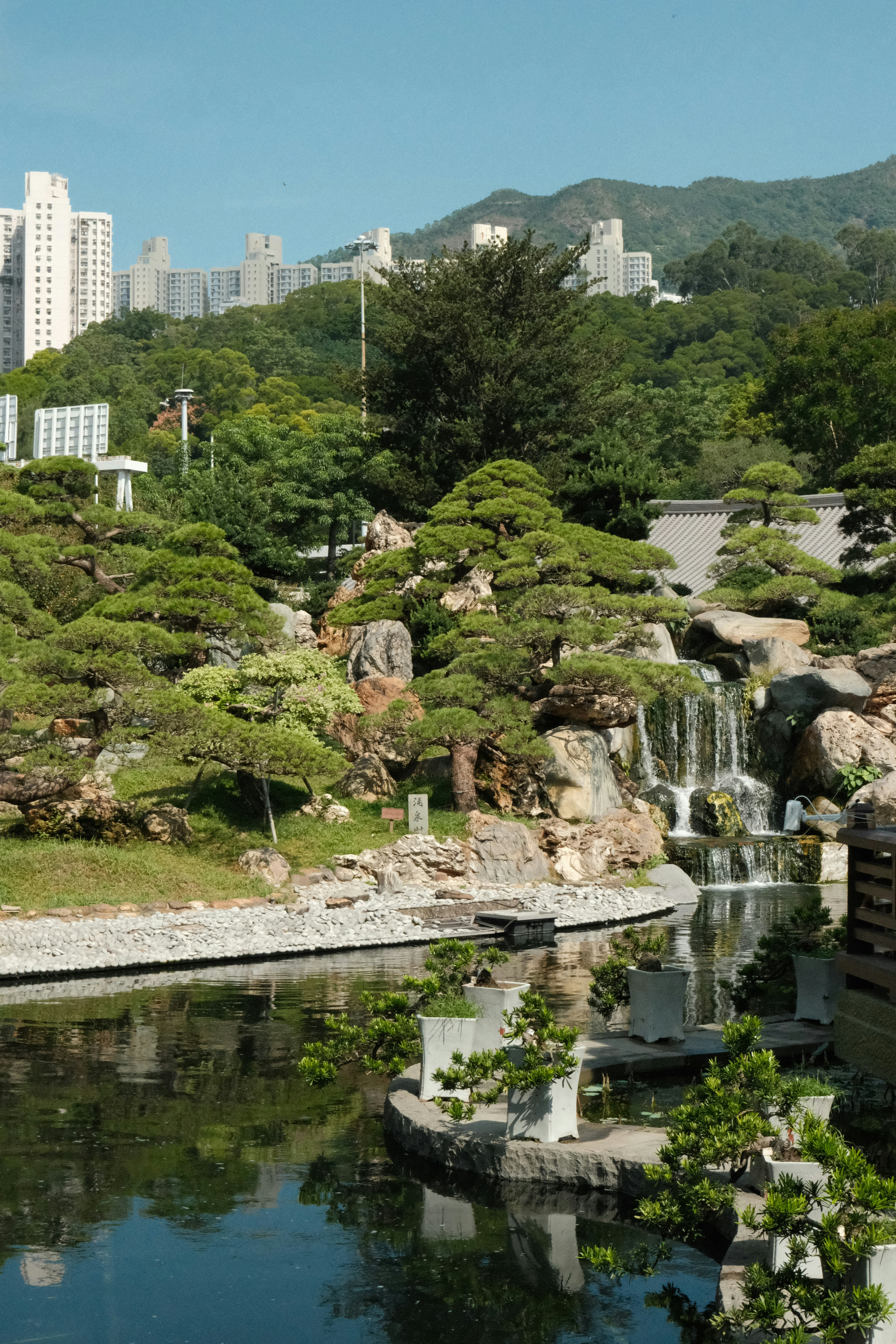 A pond with a waterfall in the middle of it