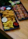 A couple of trays of food on a table