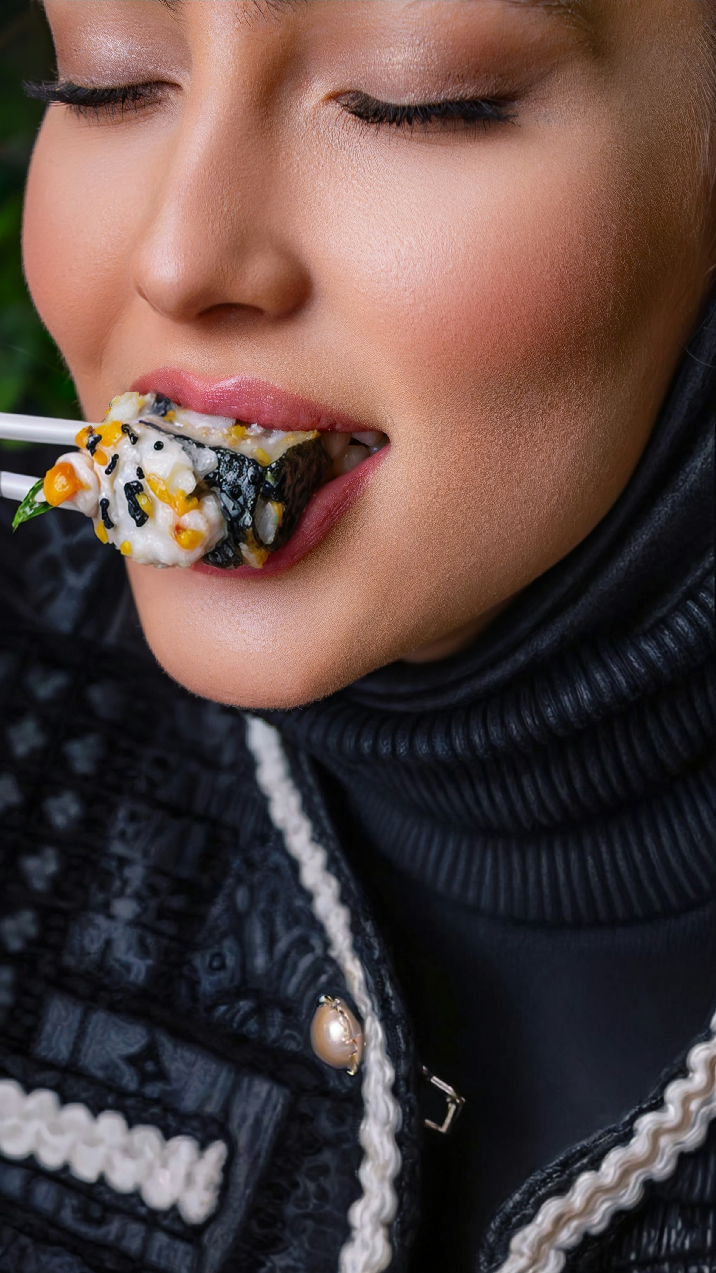 A woman with a cigarette in her mouth