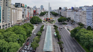 An aerial view of a city with tall buildings