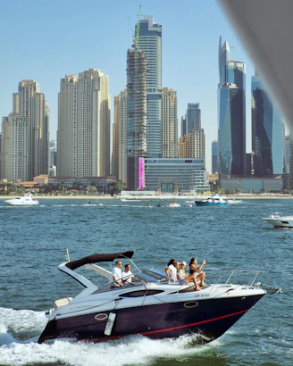 A group of people riding on the back of a boat