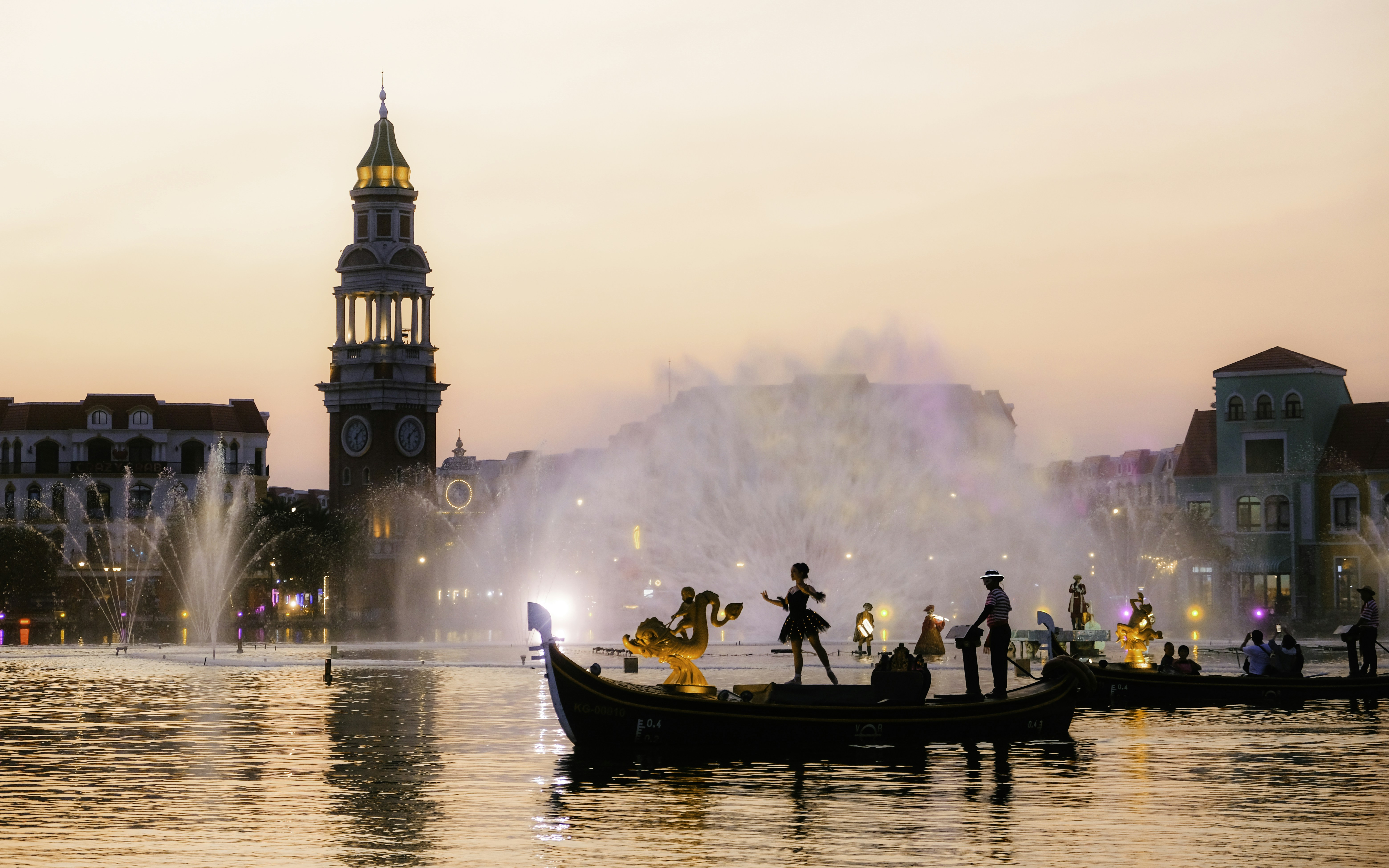 A group of people riding on top of a boat in the water photo – Free ...