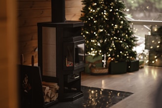 A living room filled with furniture and a christmas tree