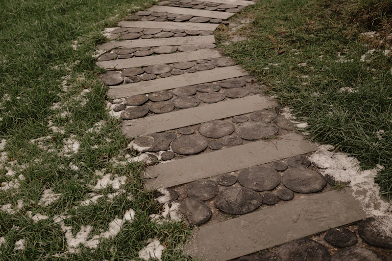 New flagstone path set into lawn leading to the house