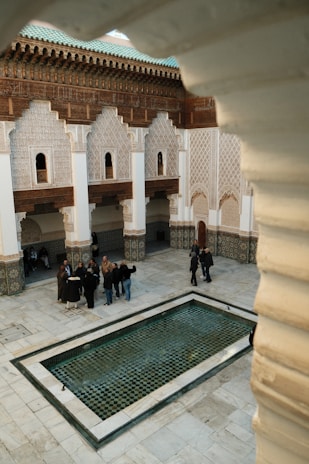 A group of people standing around a courtyard
