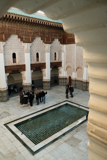 A group of people standing around a courtyard