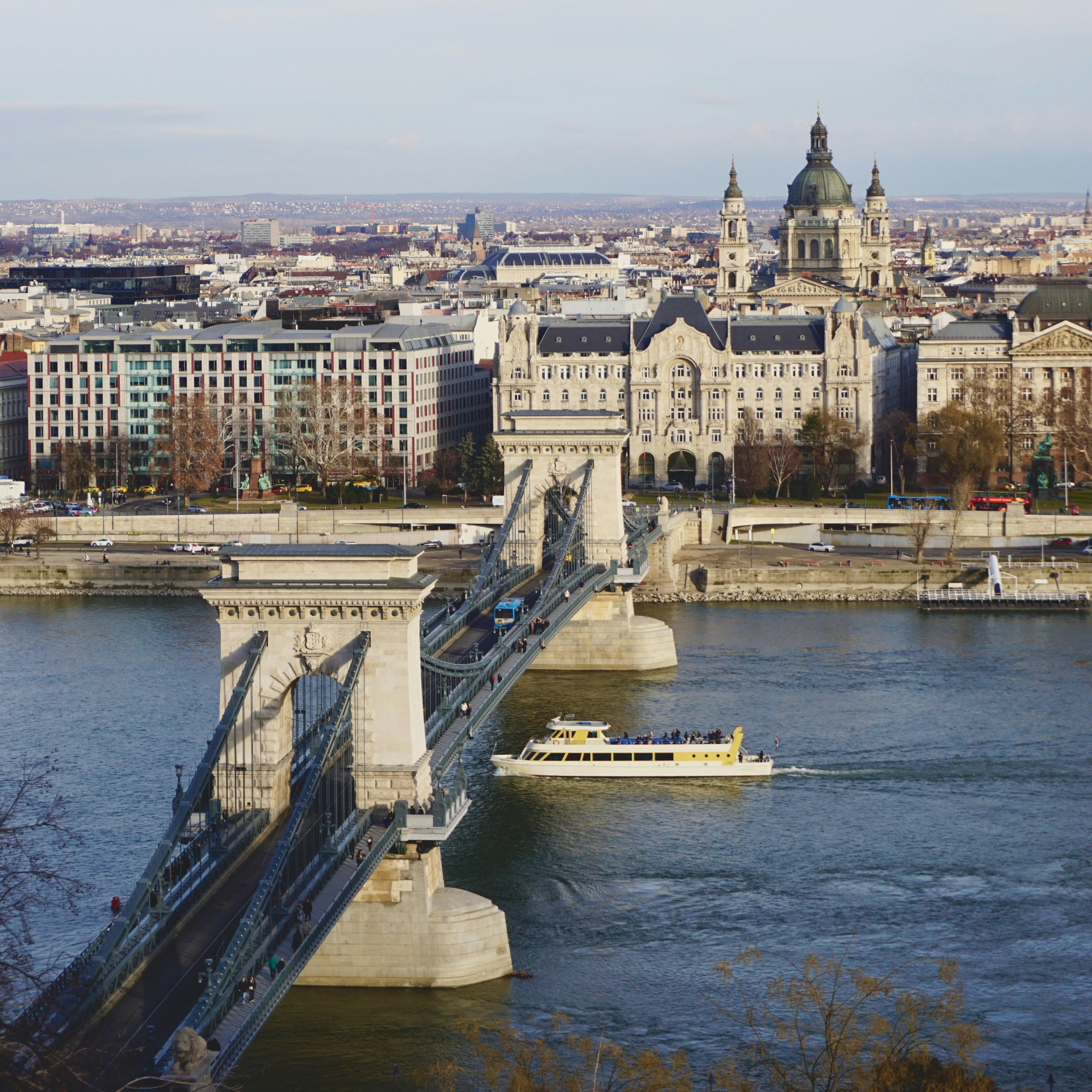 A view of a bridge over a river in a city