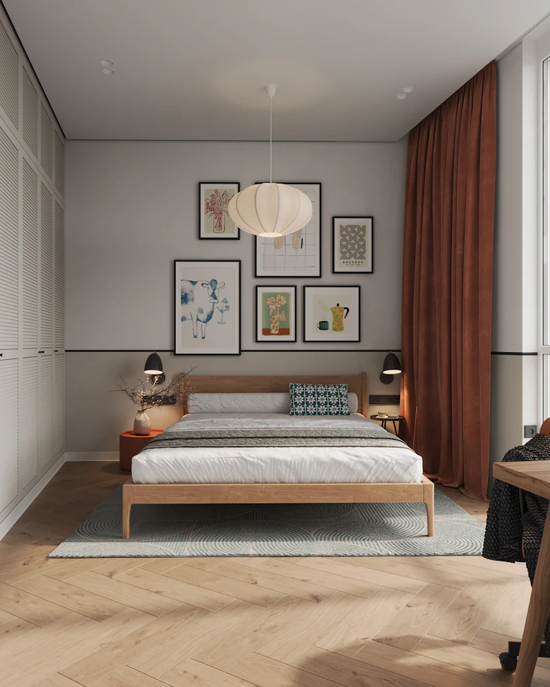 Bedroom with a bed, desk, and chair in soft natural light