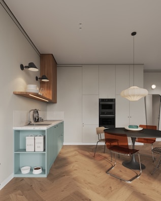 A kitchen with a table and chairs and a stove