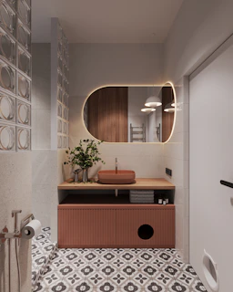 A bathroom with a sink and a mirror