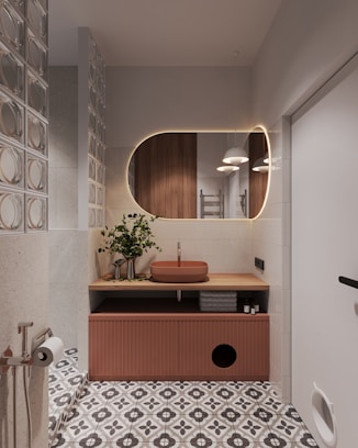 A bathroom with a sink and a mirror