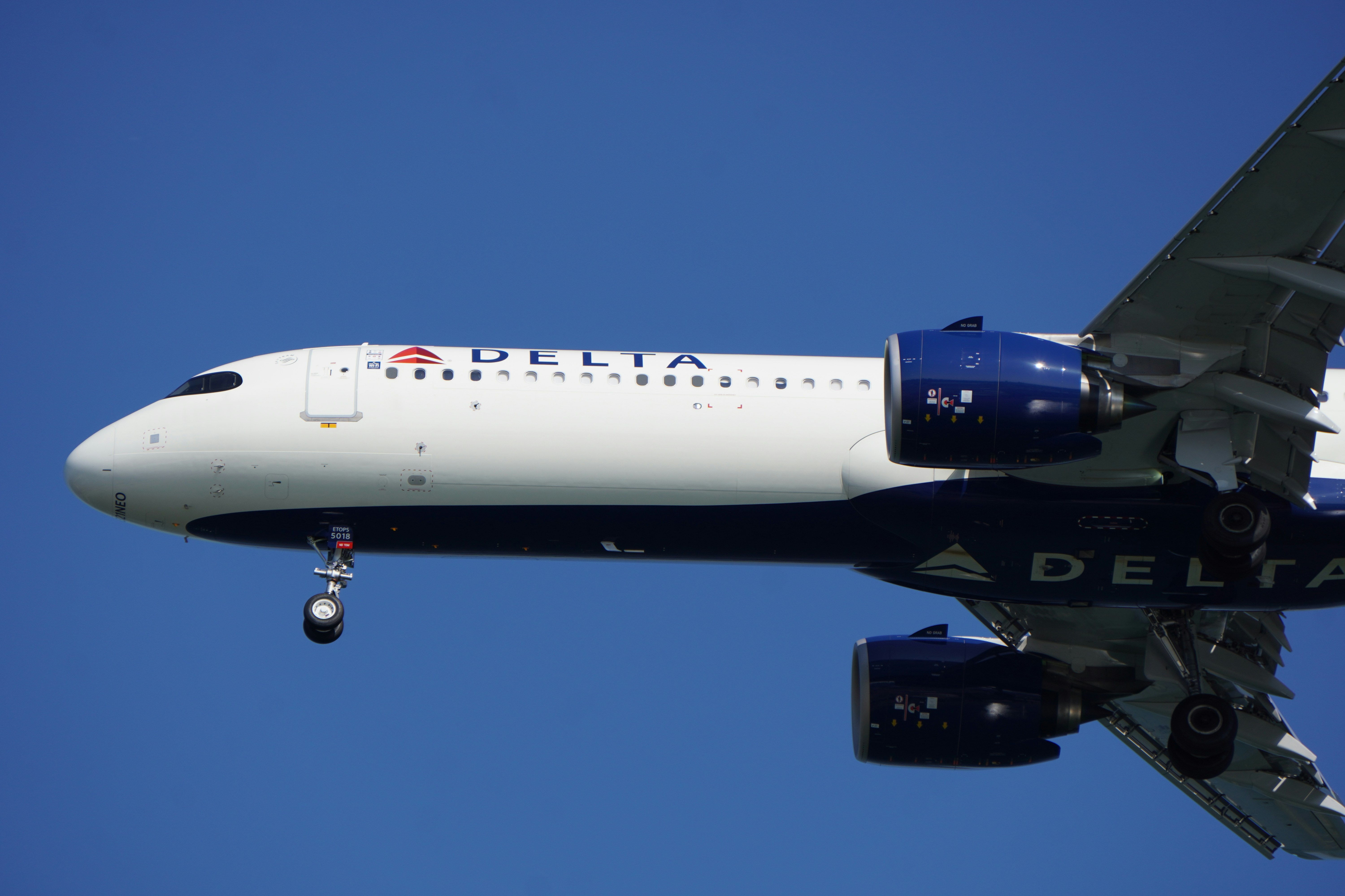 Delta's Airbus A320 Neo flying through clear skies