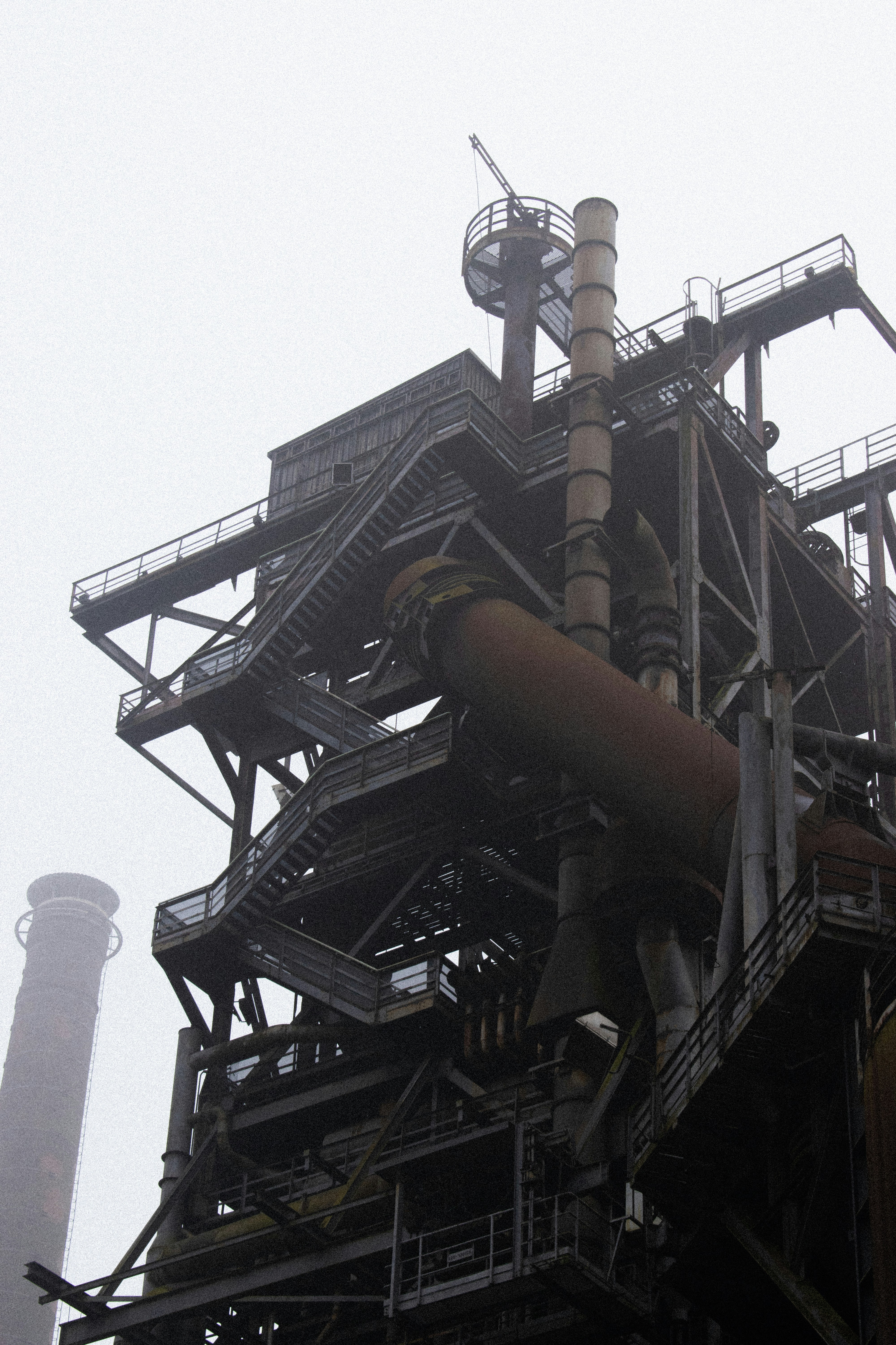 A very tall building with a lot of pipes
