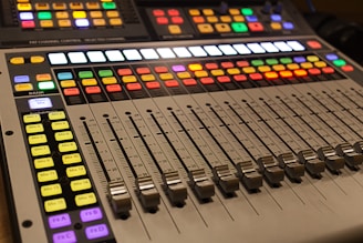 A sound board with many different colored buttons