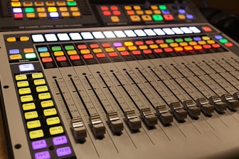 A sound board with many different colored buttons