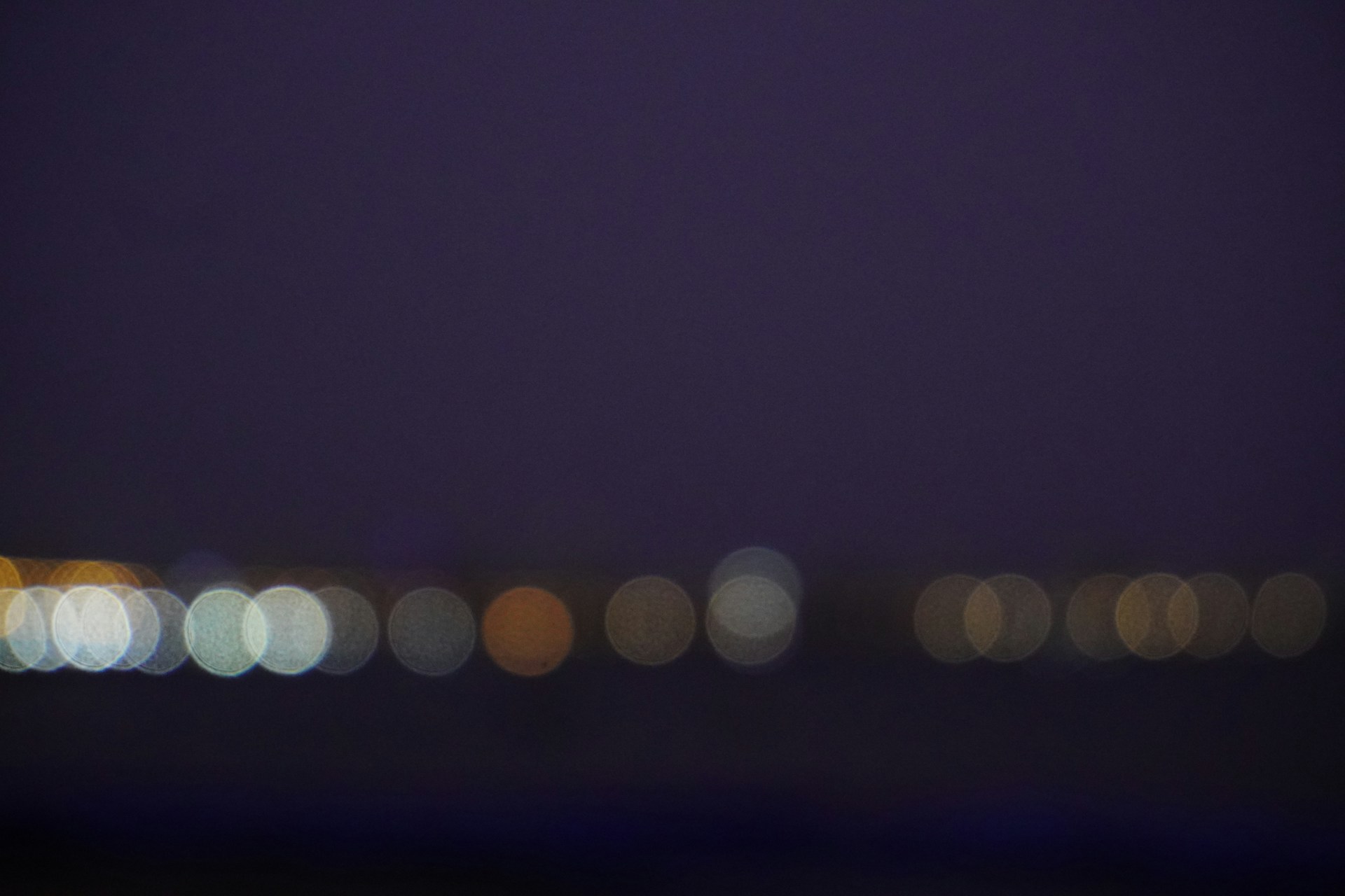 A blurry photo of a city at night