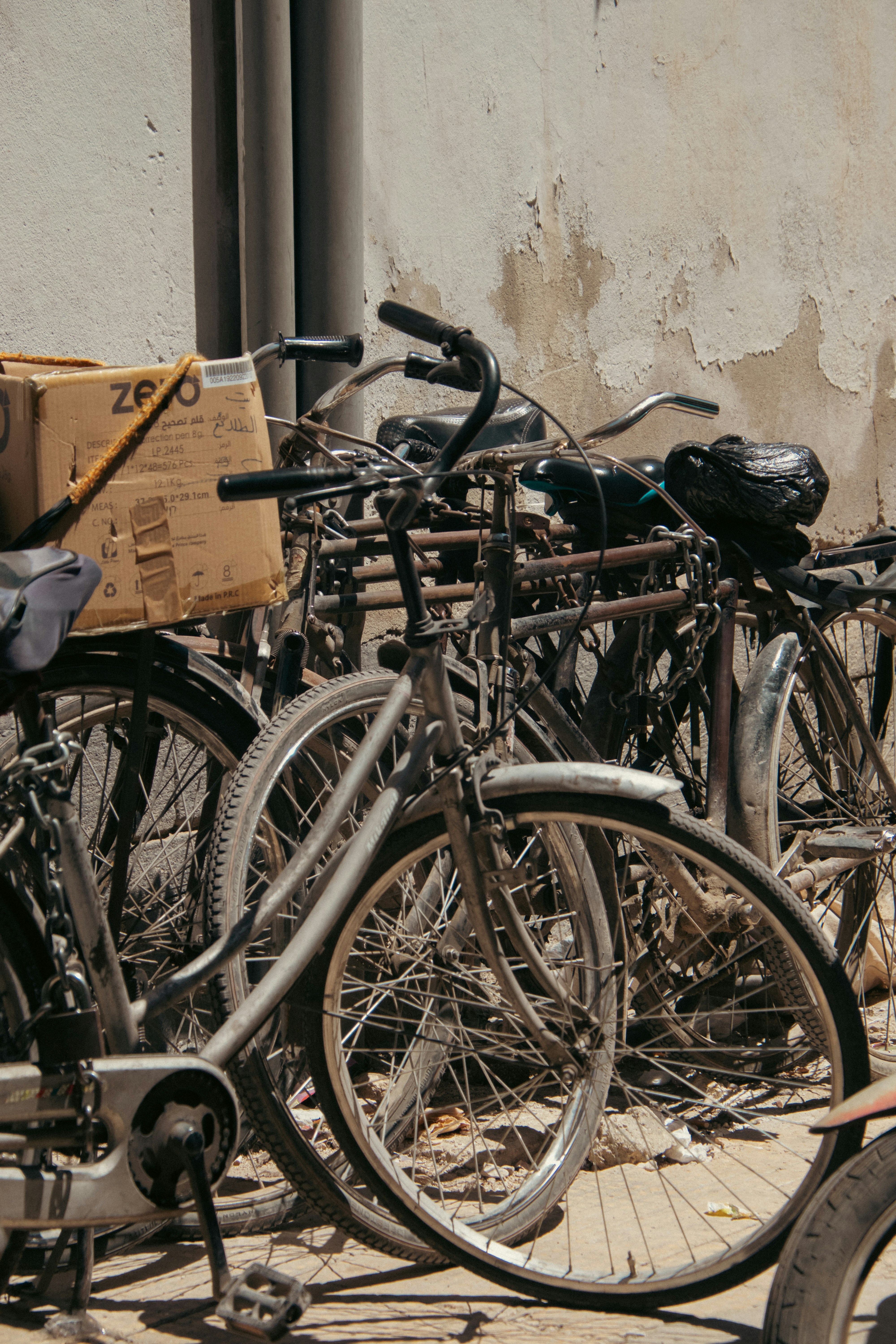A bunch of bikes parked next to each other