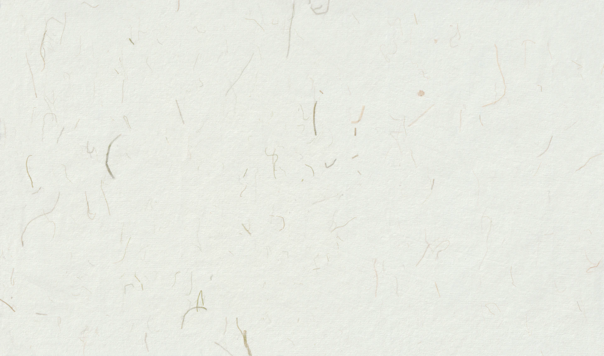 Close-up of a textured off-white surface.