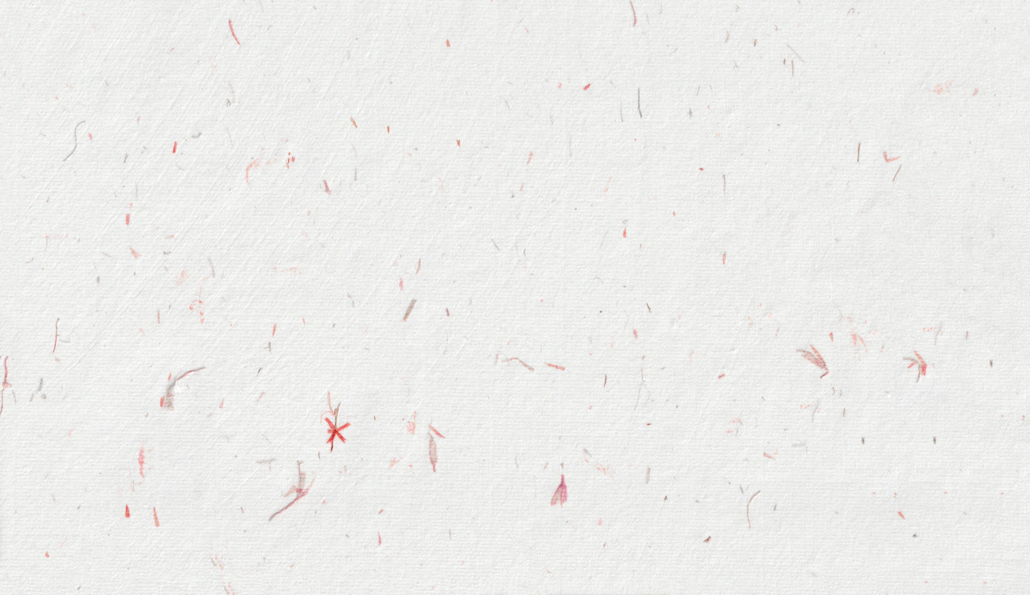 White washi scattered with fine red chiri flecks