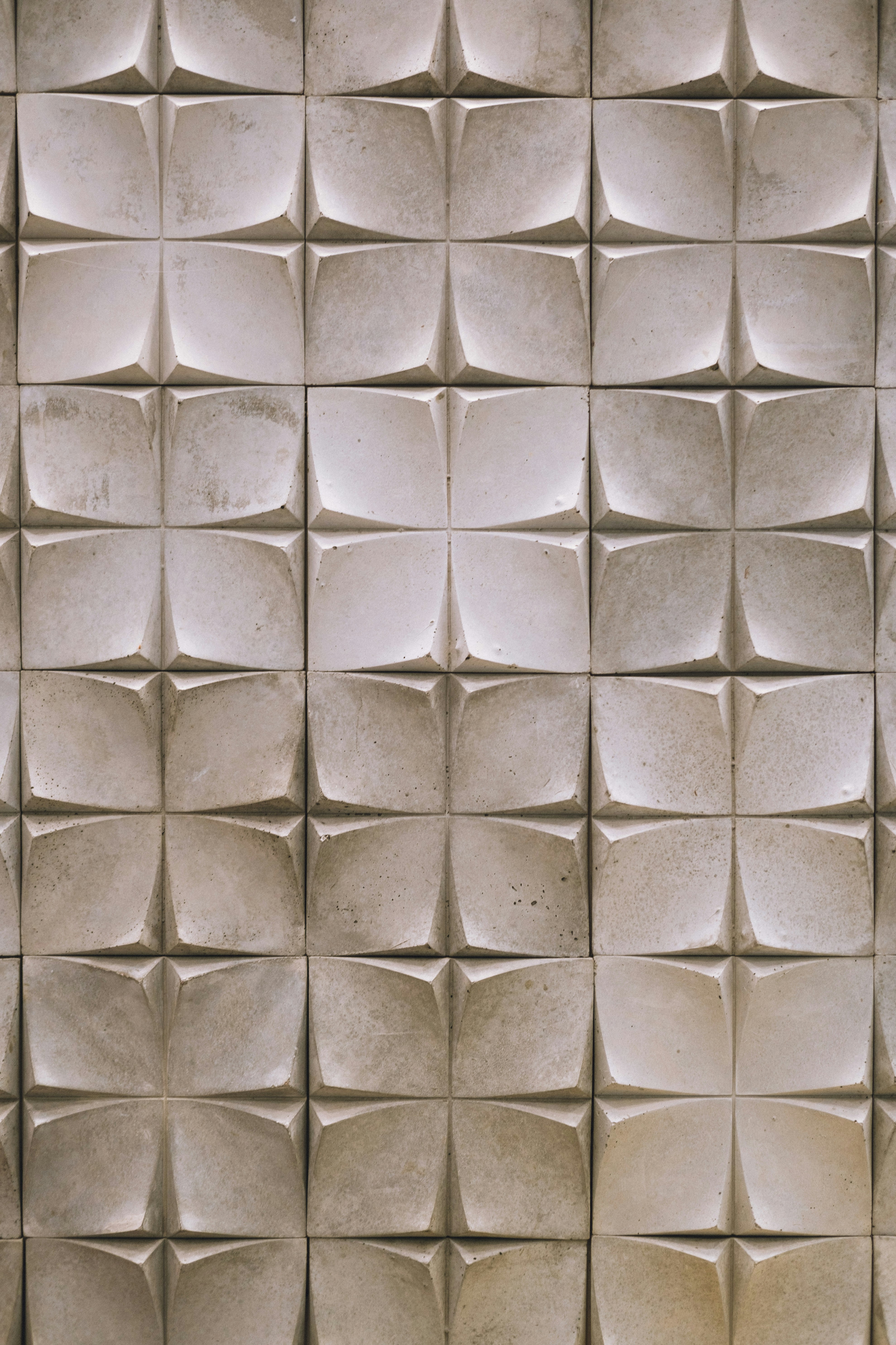 A close up of a wall made of cement blocks