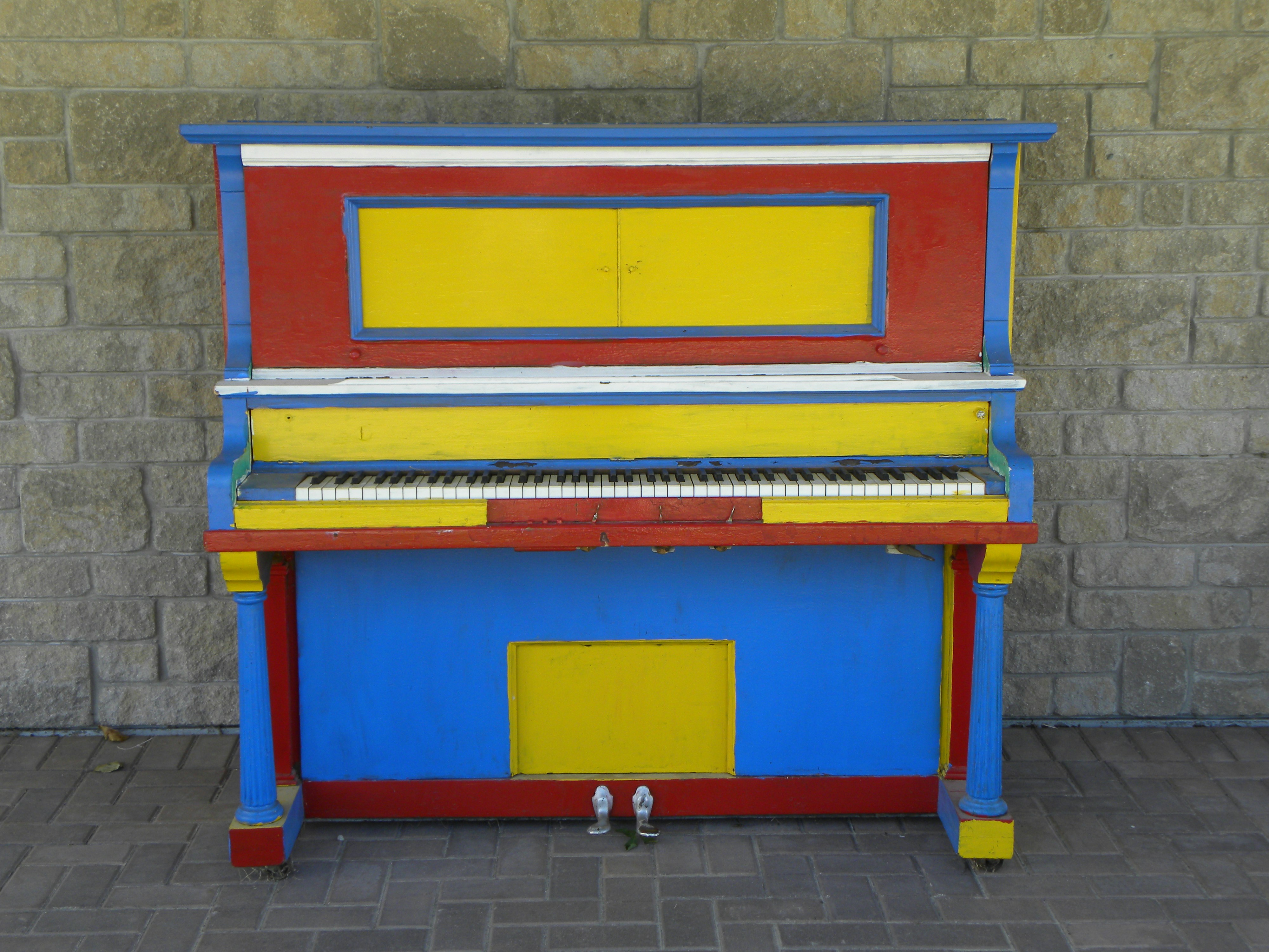 a wrapped upright piano