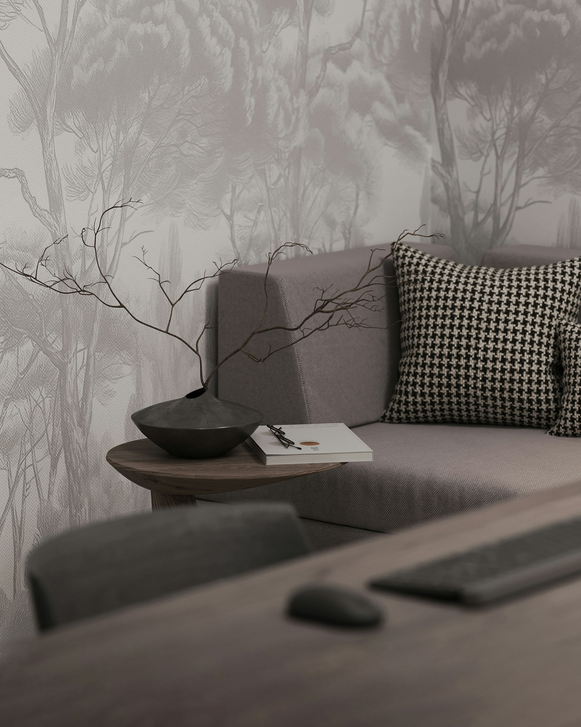 A living room with a couch and a table