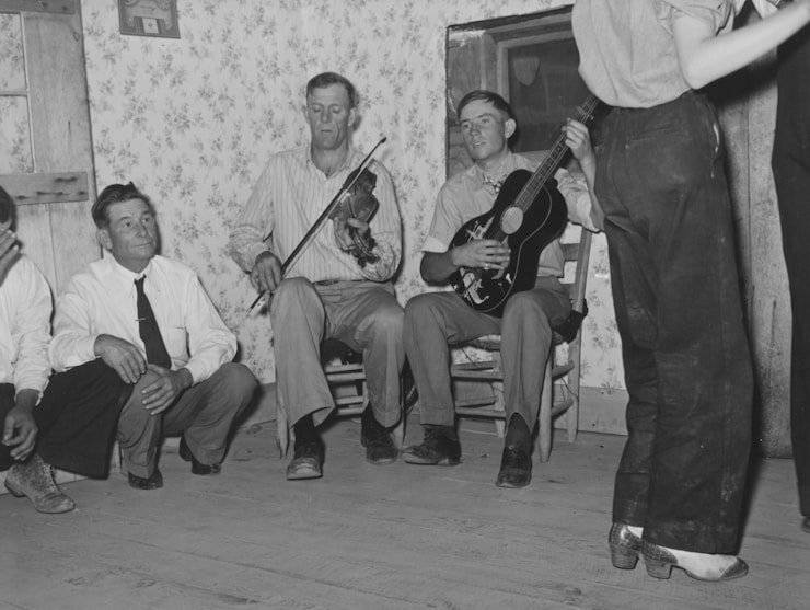 The Miriam and Ira D. Wallach Division of Art, Prints and Photographs: Photography Collection, The New York Public Library. "Musicians at the square dance. Pie Town, New Mexico" The New York Public Library Digital Collections. 1940. https://digitalcollections.nypl.org/items/3b127920-5fac-0137-c2f2-55a8efe18edb