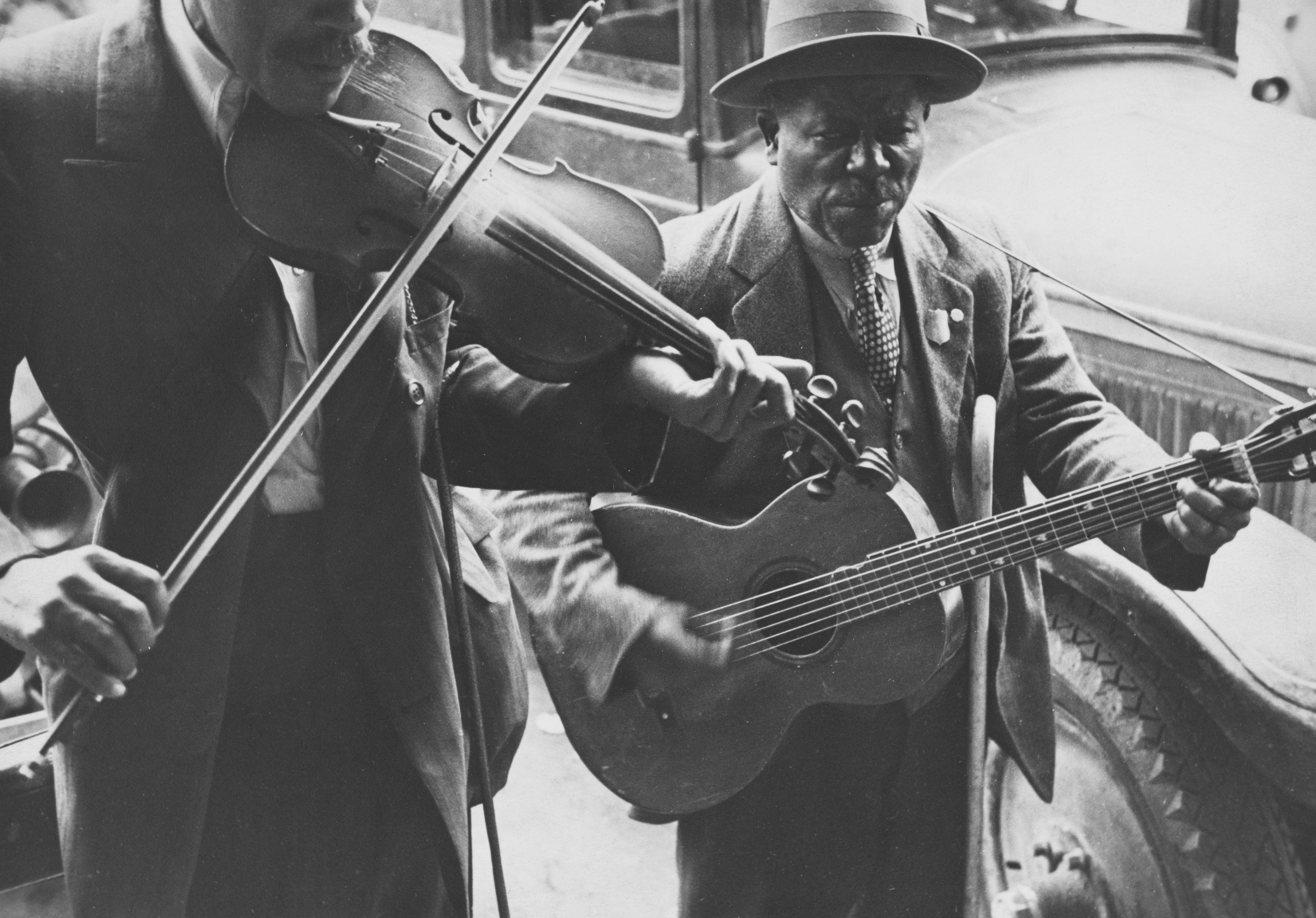 The Miriam and Ira D. Wallach Division of Art, Prints and Photographs: Photography Collection, The New York Public Library. "Street musicians. West Memphis, Arkansas" The New York Public Library Digital Collections. 1935. https://digitalcollections.nypl.org/items/3b5108d0-da36-0132-406b-58d385a7bbd0
