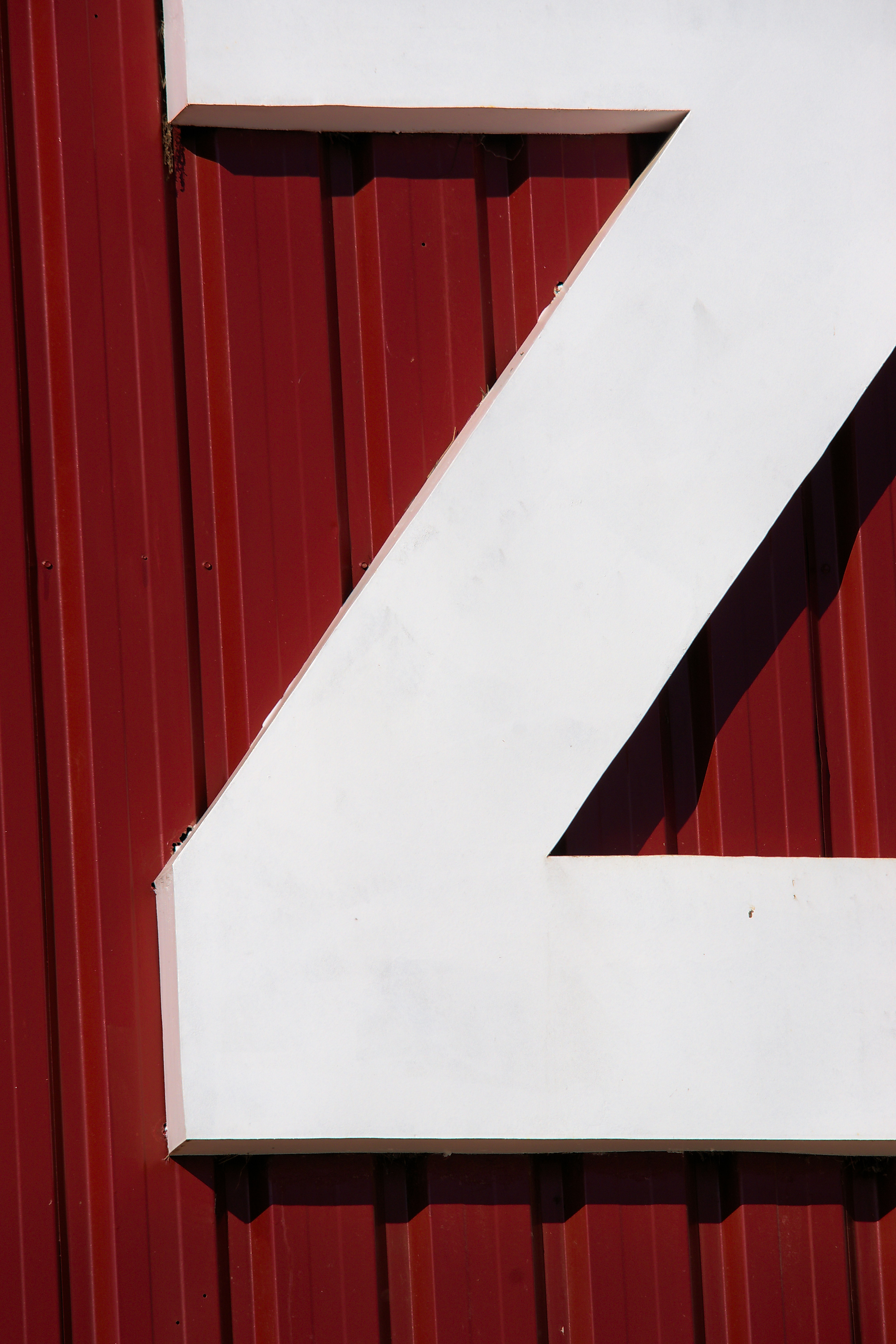 A close up of a sign on a building photo – Free Number Image on Unsplash