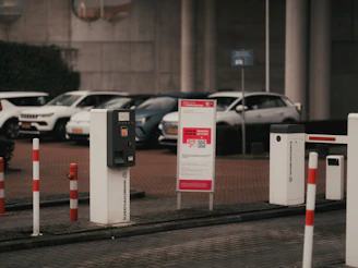A row of parking meters sitting next to each other