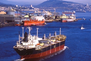 A large cargo ship in a body of water