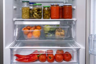A refrigerator filled with lots of different types of food