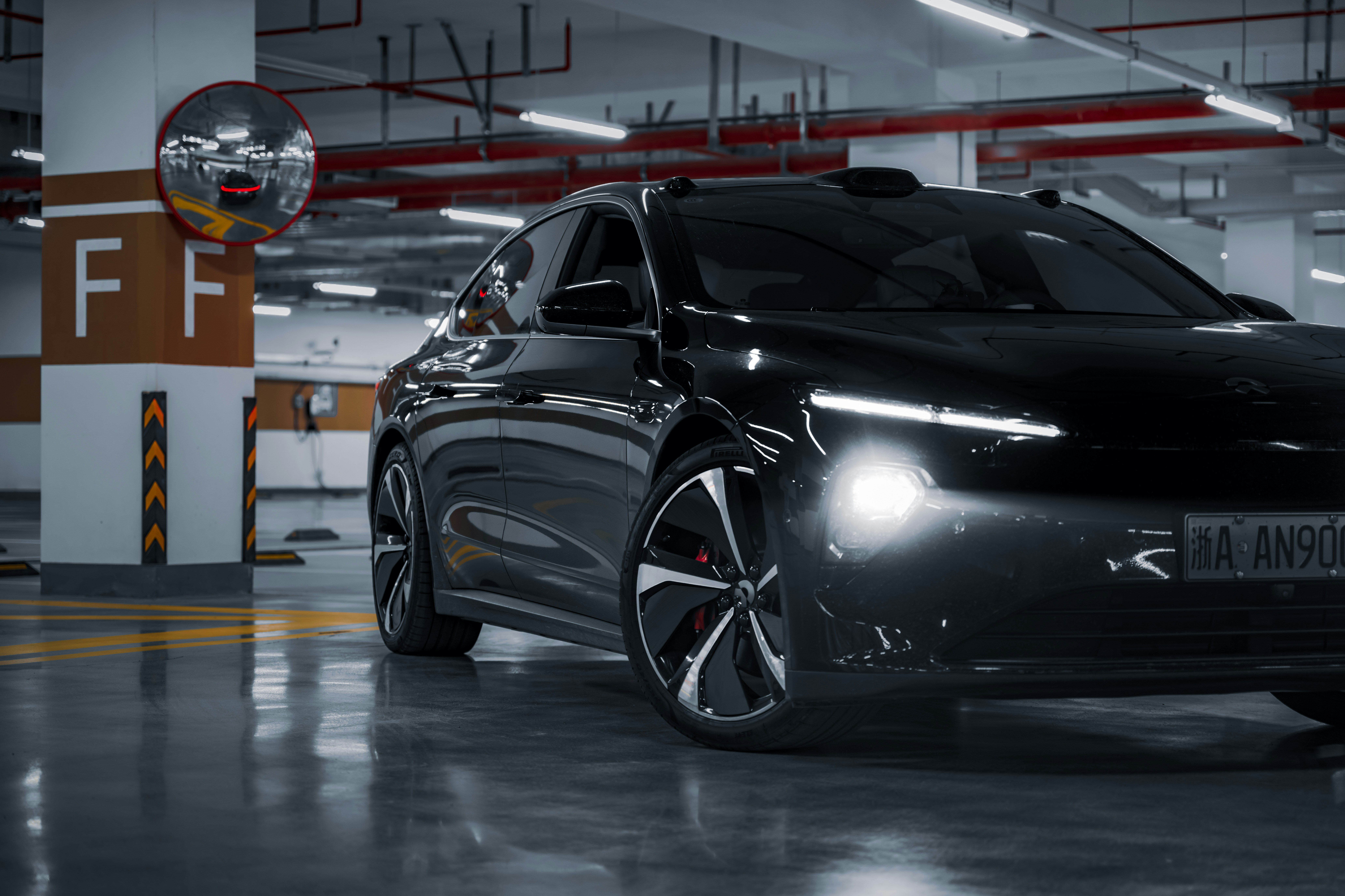 A person typing on a laptop, with a blurred city background, symbolizing the search for someone online.