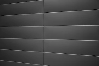 A black and white photo of a wall