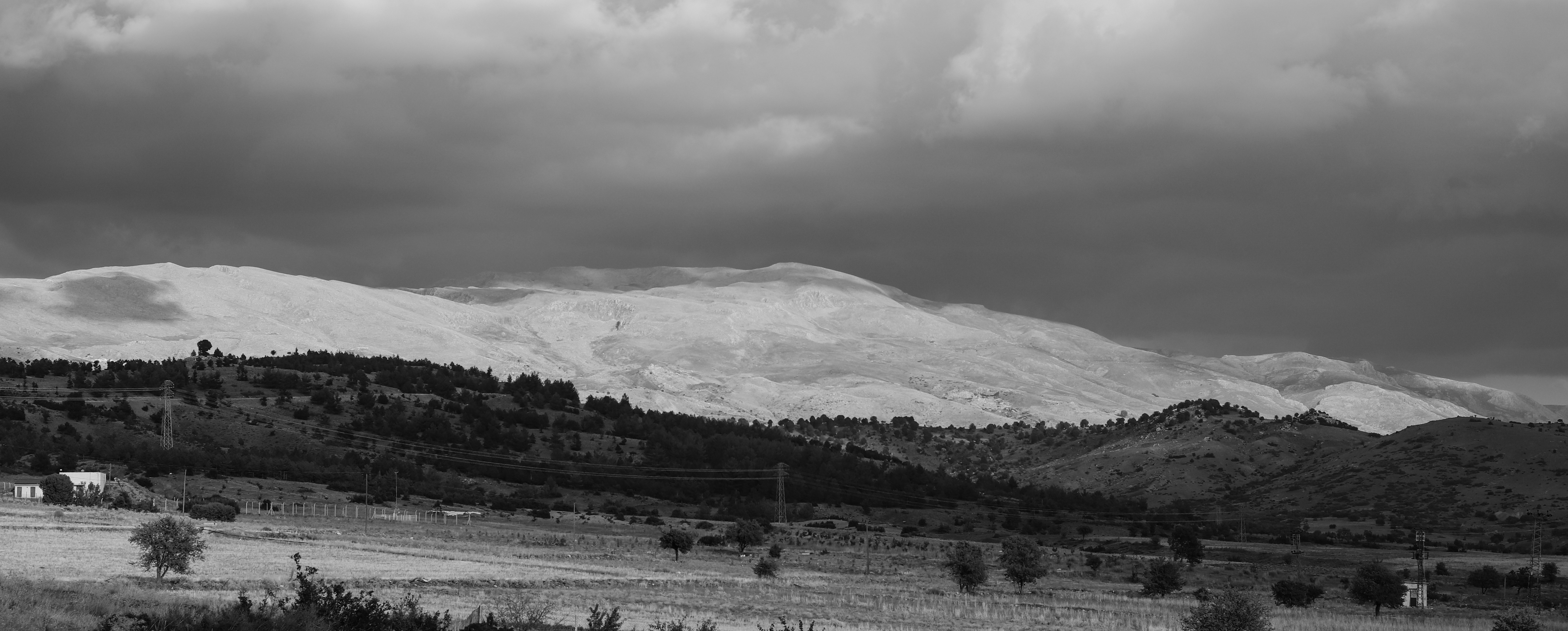 A black and white photo of a mountain range