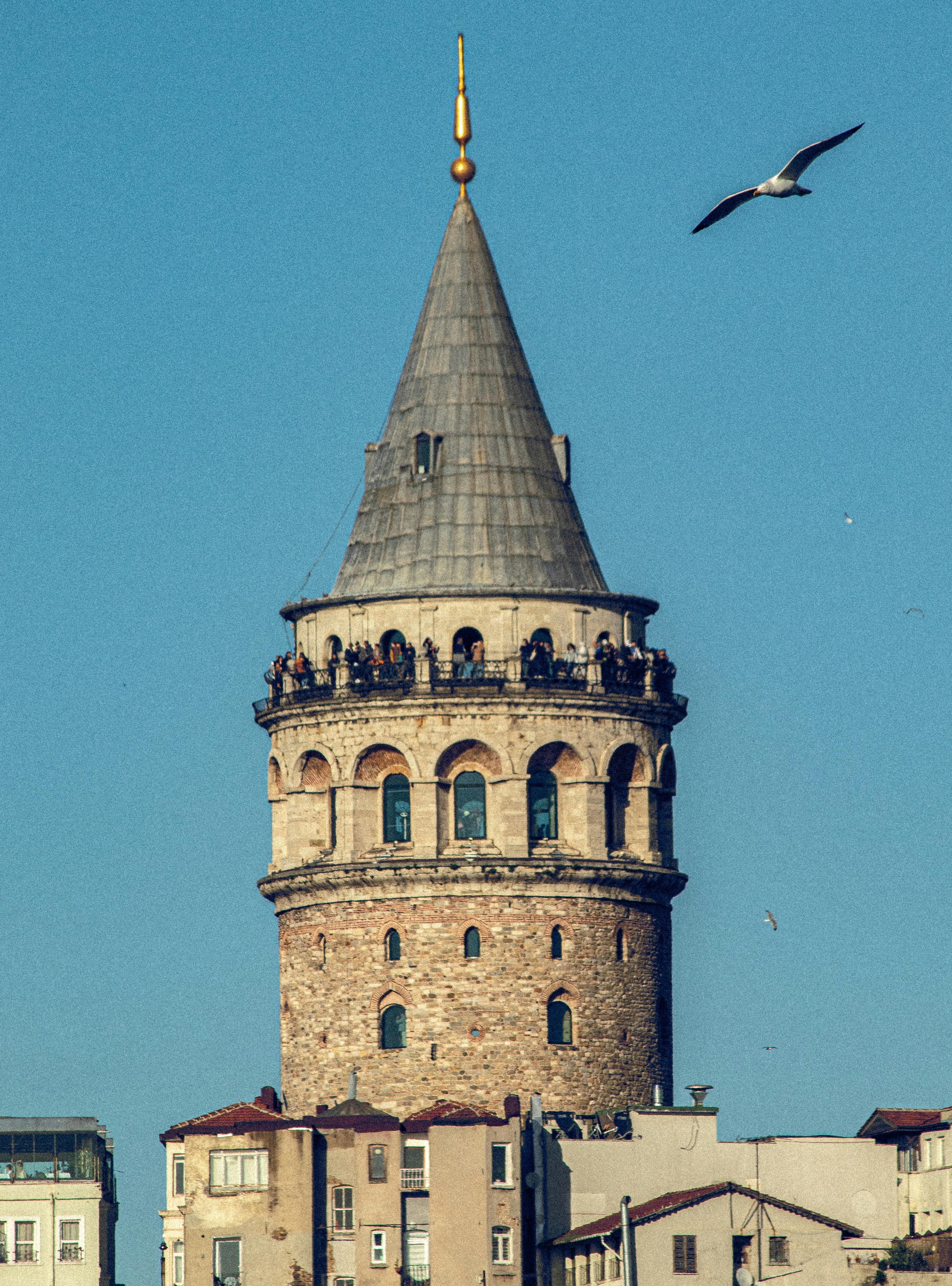 A tall tower with a clock on the top of it