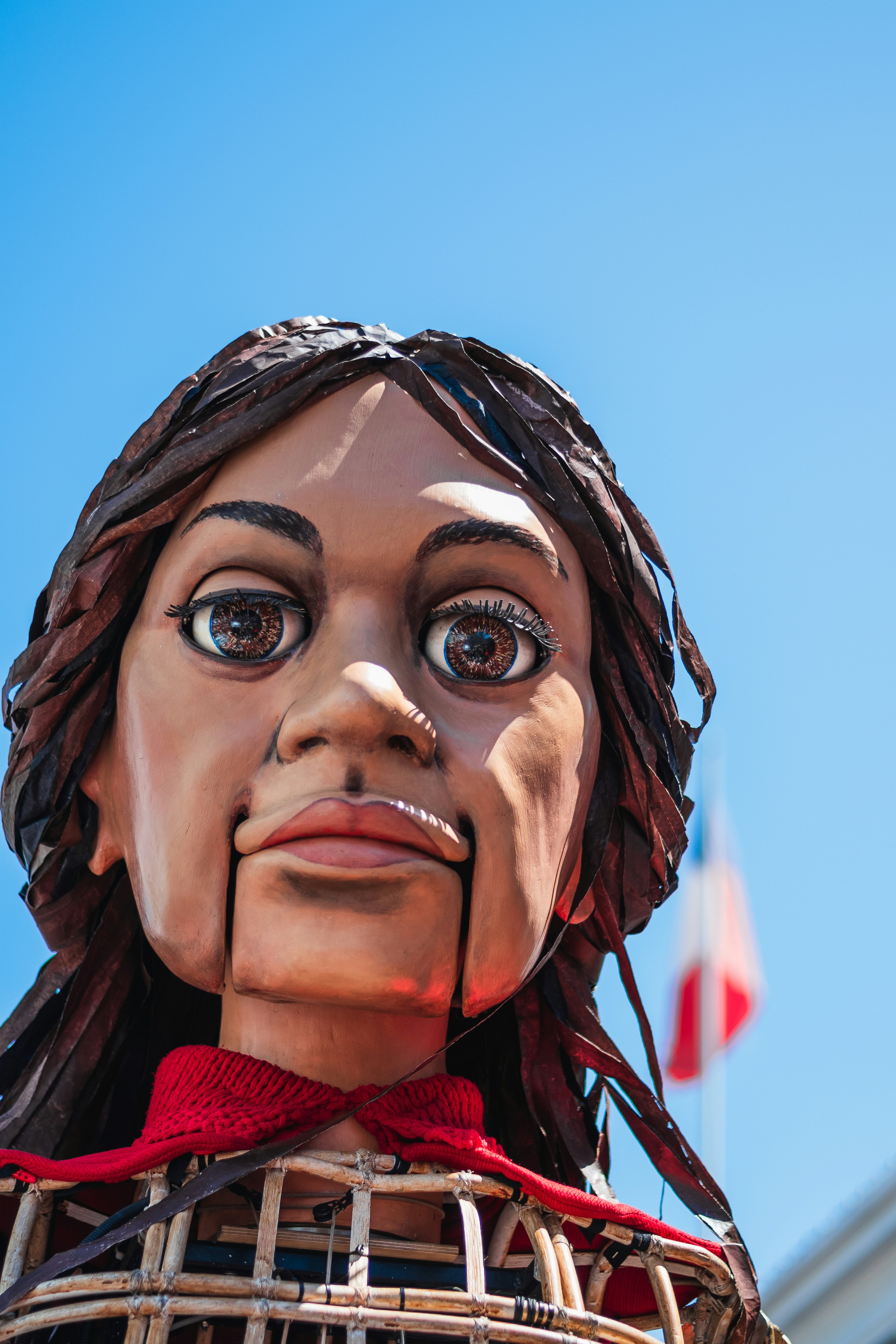 A statue of a woman with a basket on her head