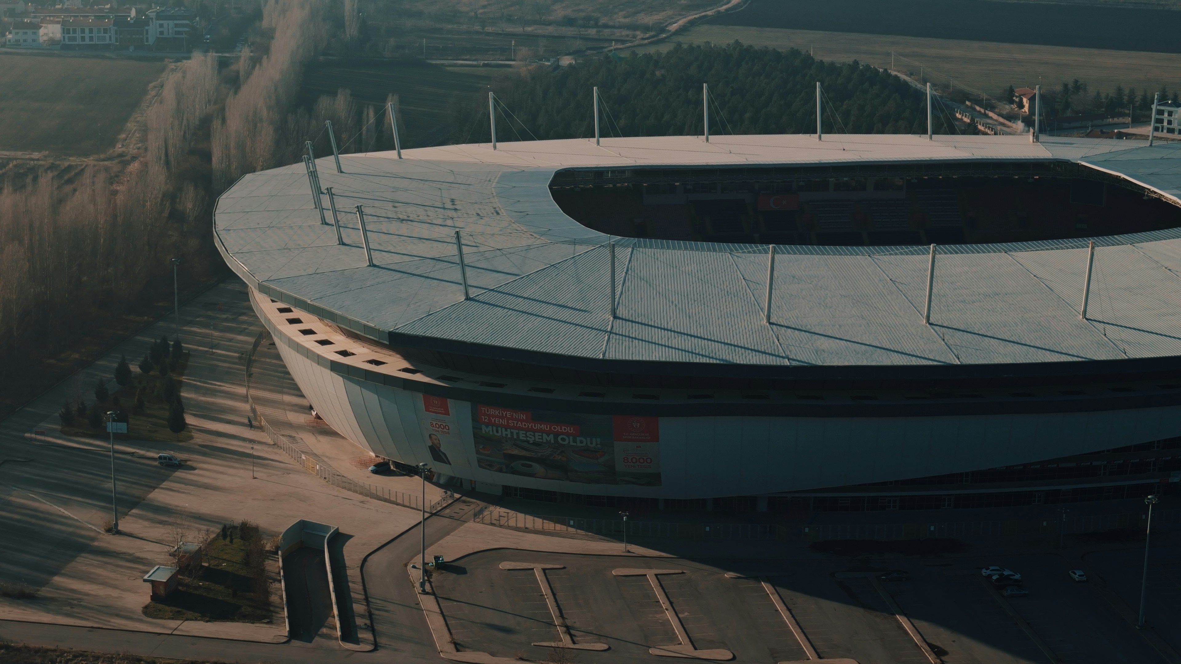An aerial view of a large building with a sky background