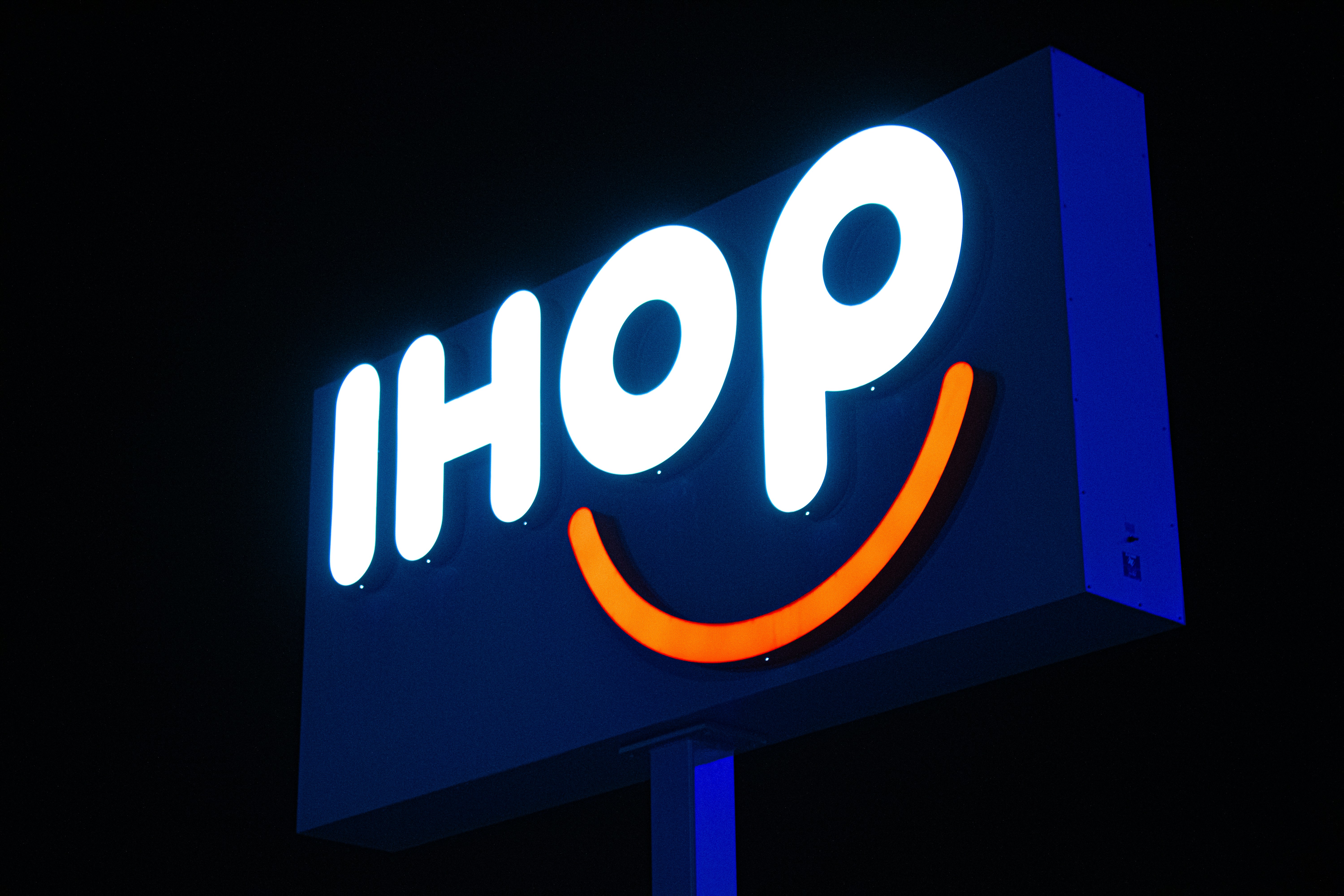 IPO process explained A blue sign with an orange logo on it