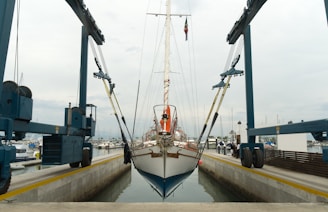 A boat docked at a dock in the water