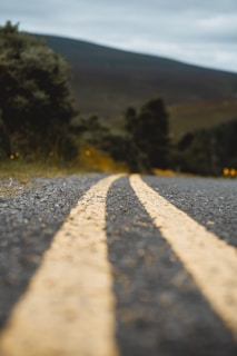 An empty road with two white lines painted on it