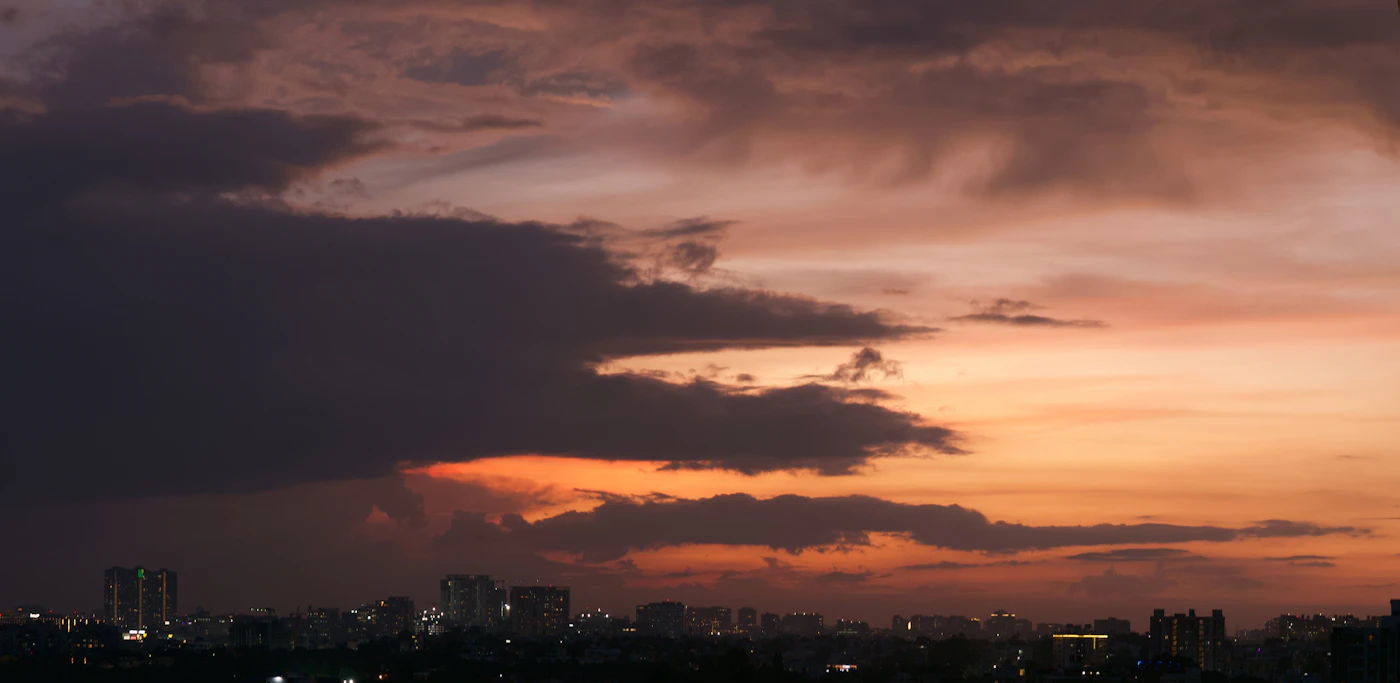 Bangalore skyline at sunset representing local unit locations