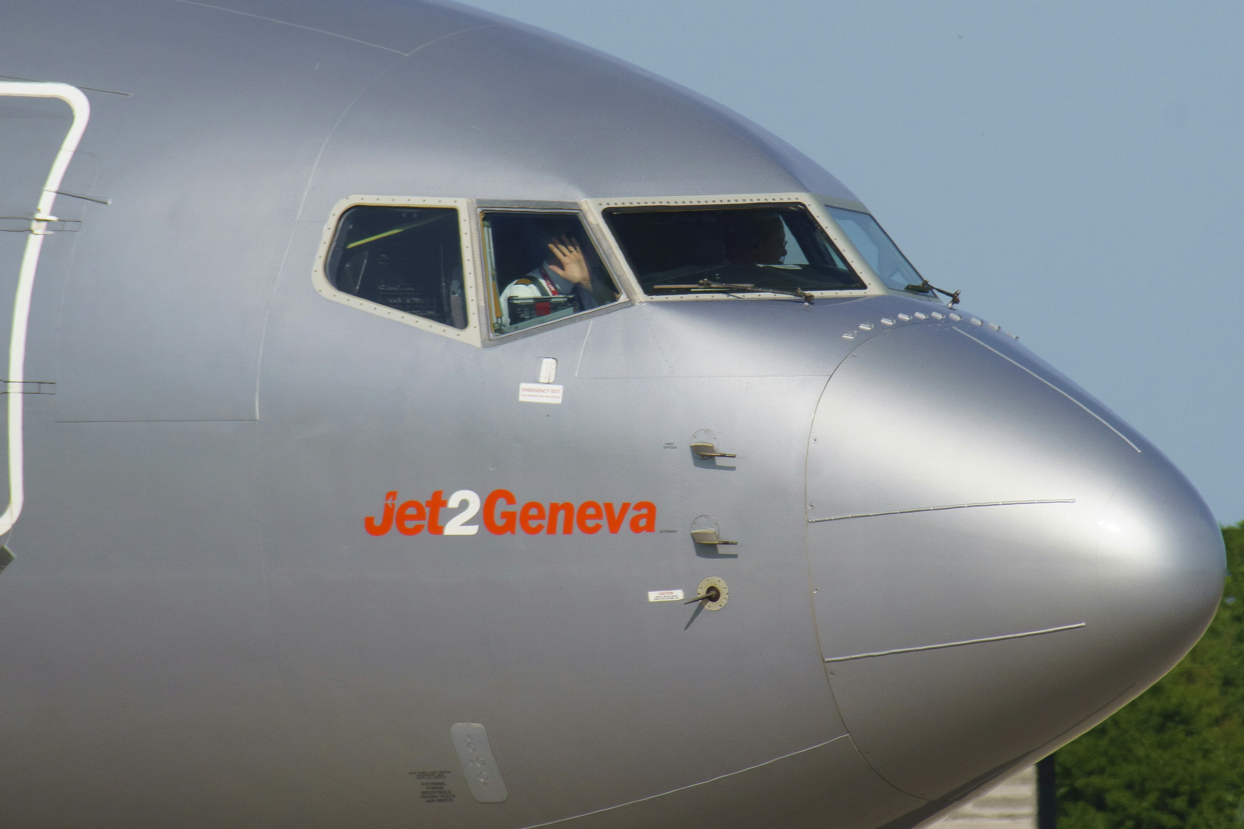 A large jetliner sitting on top of an airport tarmac