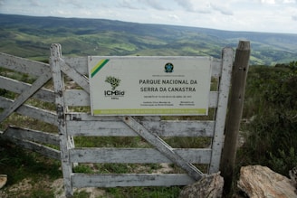 A wooden gate on top of a mountain