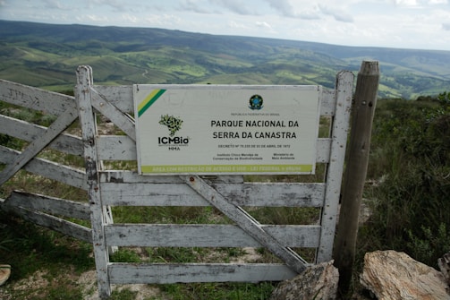 A wooden gate on top of a mountain