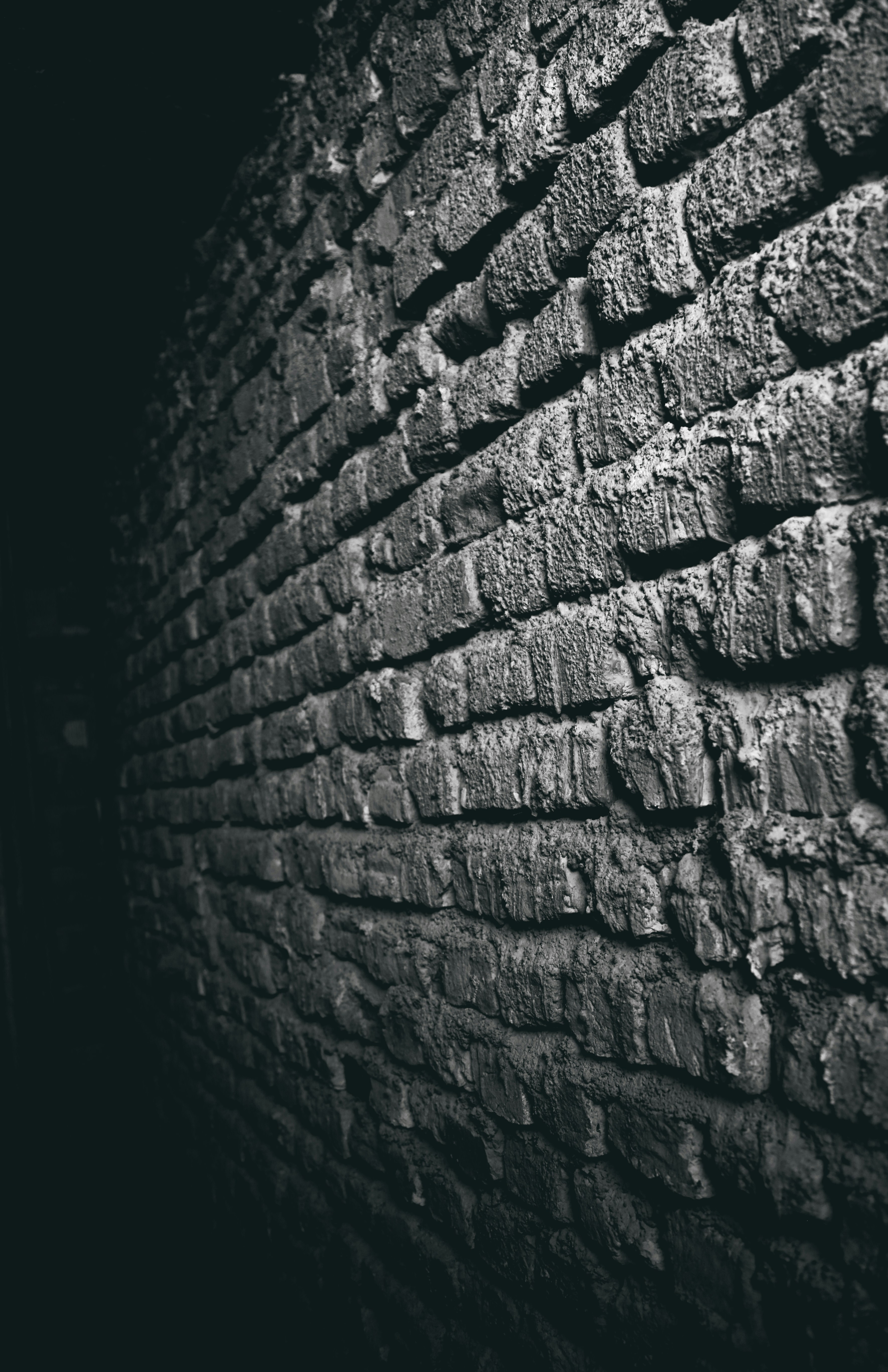 A black and white photo of a brick wall photo – Free Wallpaper Image on  Unsplash, image size:3000x4637