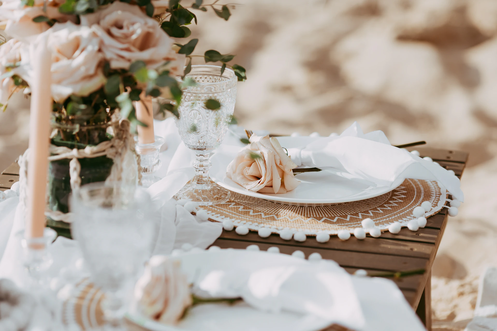 A table is set with flowers and plates