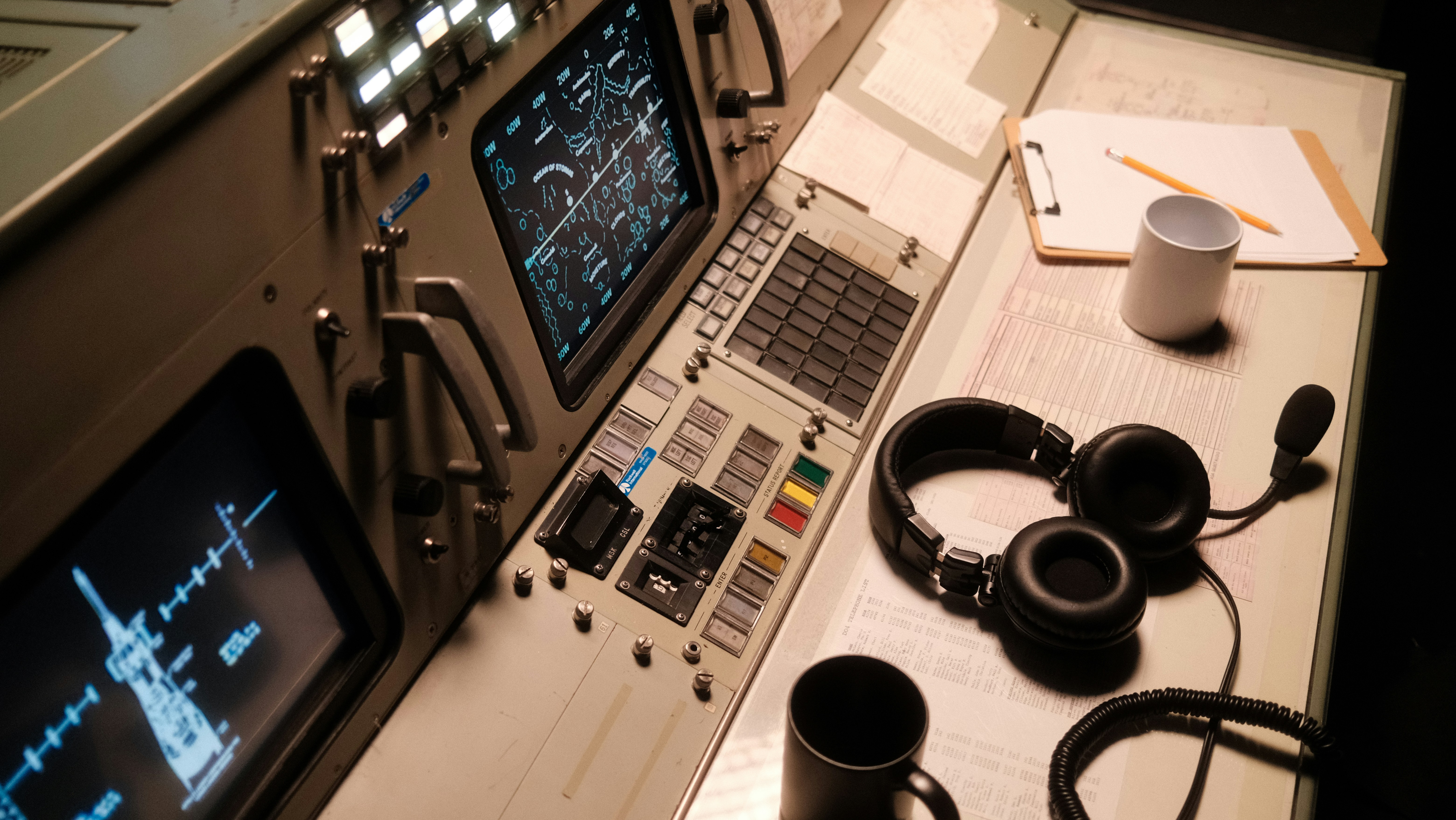 A control panel with headphones and headphones on it